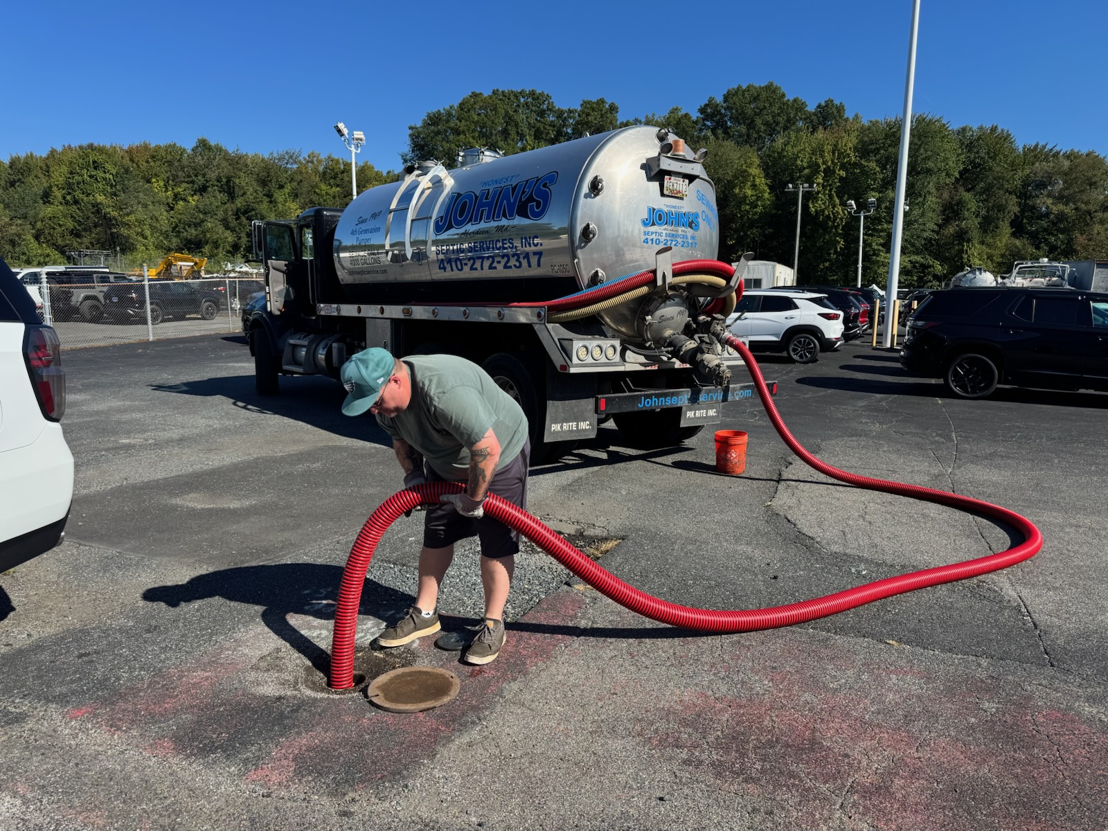 John's Septic Service pump truck at work